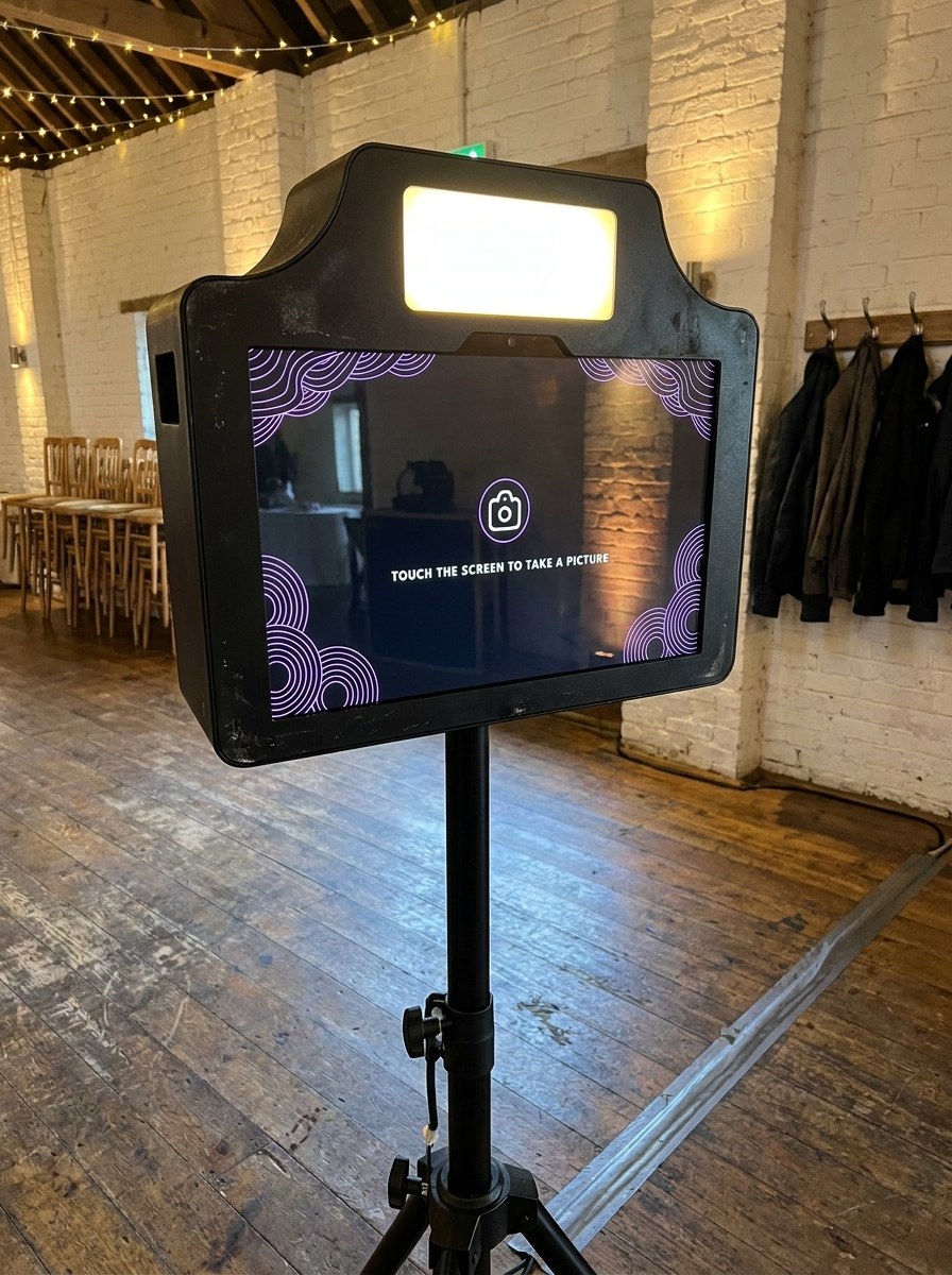 The black photobooth on a tripod, ready to use